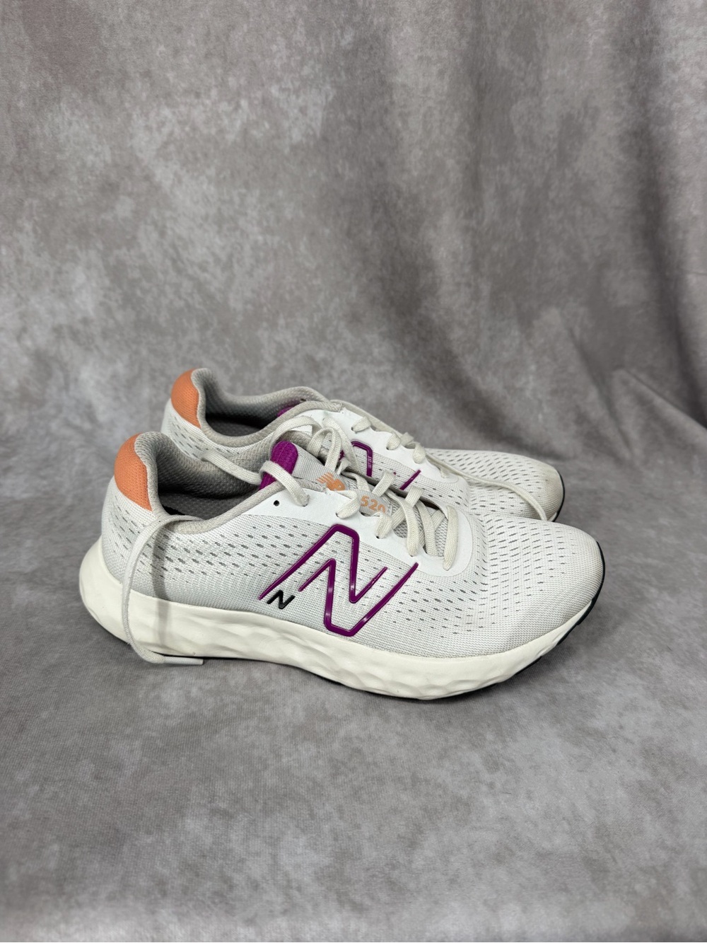 New Balance Women's White Running Shoes with Purple Logo and Peach Heel